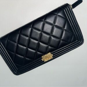 CHANEL Black Quilted Clutch with Gold Accent